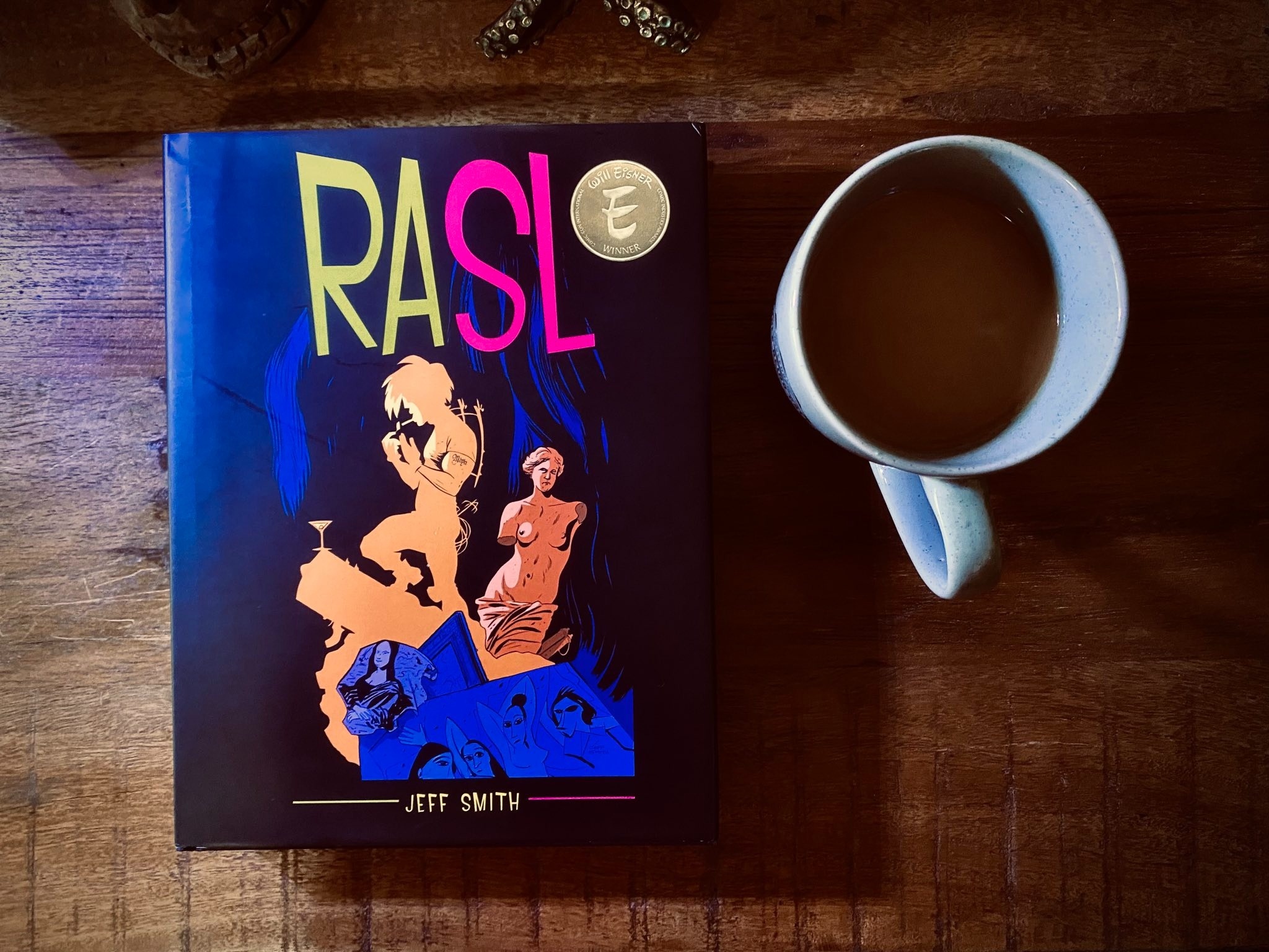 Jeff Smith's RASL beside mug of coffee