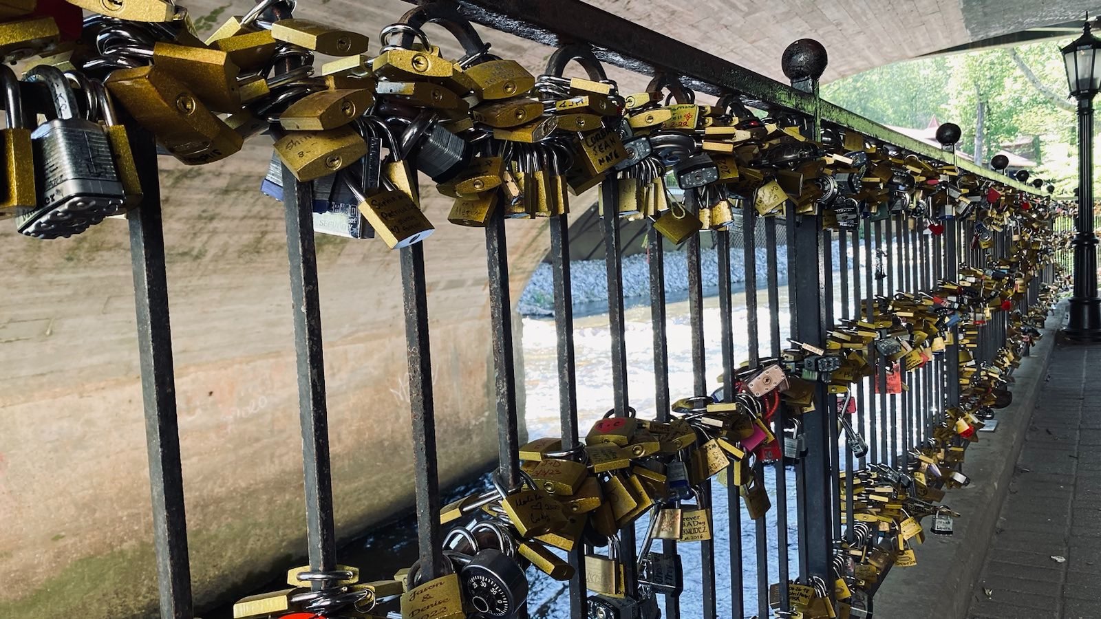 padlocks on wrought iron fence